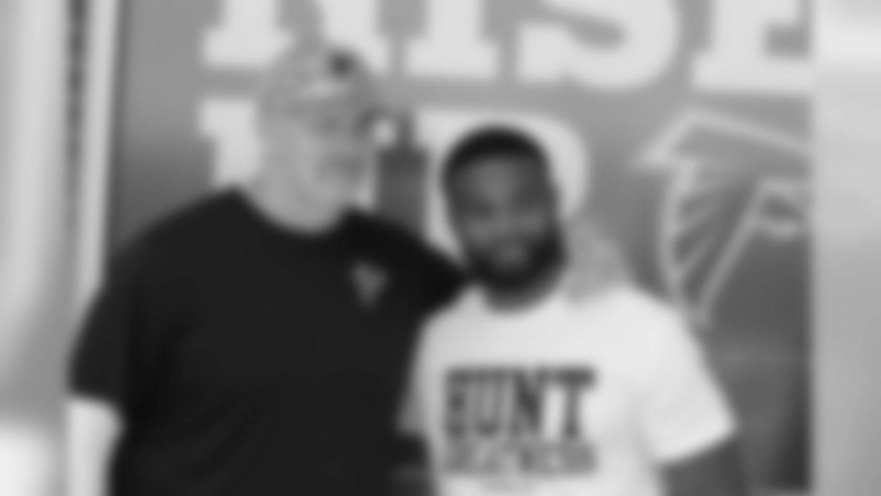 Head coach Dan Quinn and Tyron Woodley