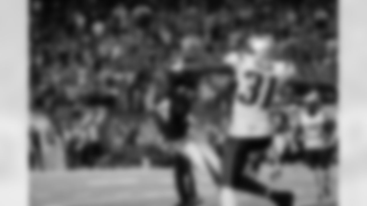 WR Roddy White reaches for the ball against Patriots CB Aquib Talib