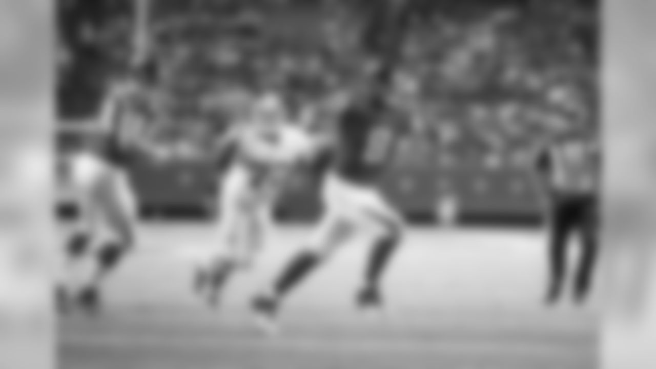 QB Matt Schaub takes off as the pocket collapses