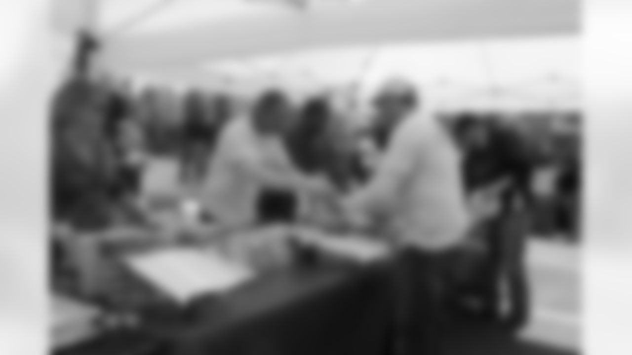 Arthur Blank serves lunch after a long morning of community work // Blank Family of Businesses 2011 Community Day // 5/5/11 // Atlanta, Ga. —