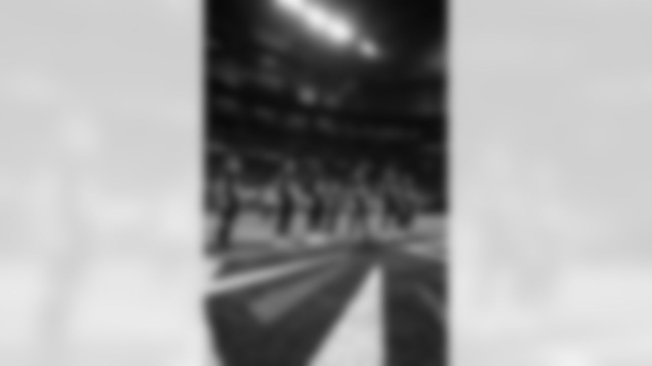 Captains walk to midfield for the coin toss prior to the Week 1 Game against the Carolina Panthers at Mercedes-Benz Stadium in Atlanta, Georgia on Sunday, September 10, 2023. (Photo by Mitch Martin/Atlanta Falcons)