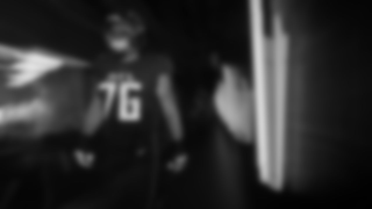Atlanta Falcons tackle Kaleb McGary #76 walks out of the locker room before the game against the Chicago Bears at Mercedes-Benz Stadium in Atlanta, Georgia on Sunday, November 20, 2022. (Photo by Mitchell Martin/Atlanta Falcons)