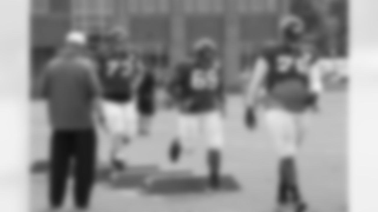 T Ryan Schraeder, G Harland Gunn and T Lamar Holmes run through a drill