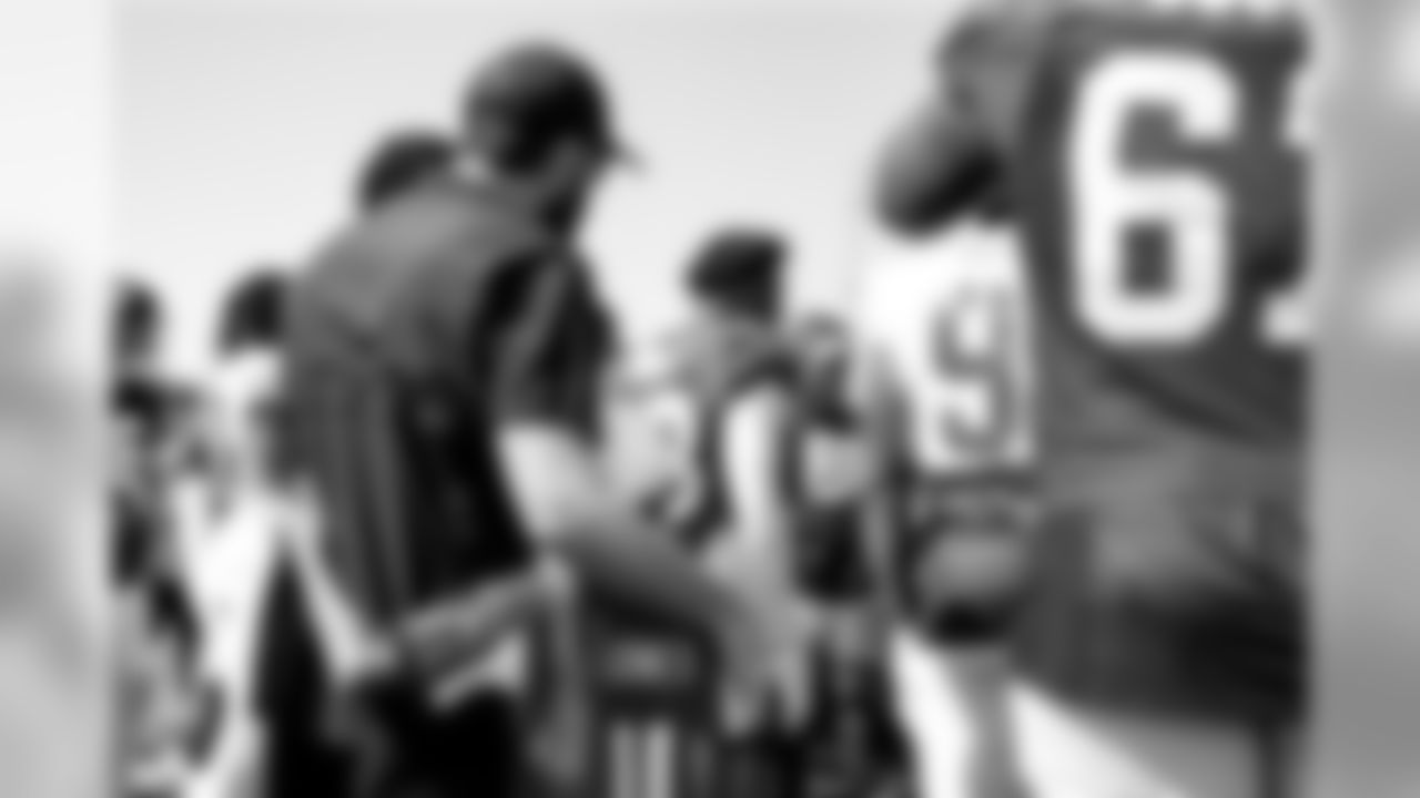 July 29, 2019 - Steve Scarnecchia takes D'Eric Salder into the huddle on the seventh day of practice. (Photo by Kara Durrette/Atlanta Falcons)