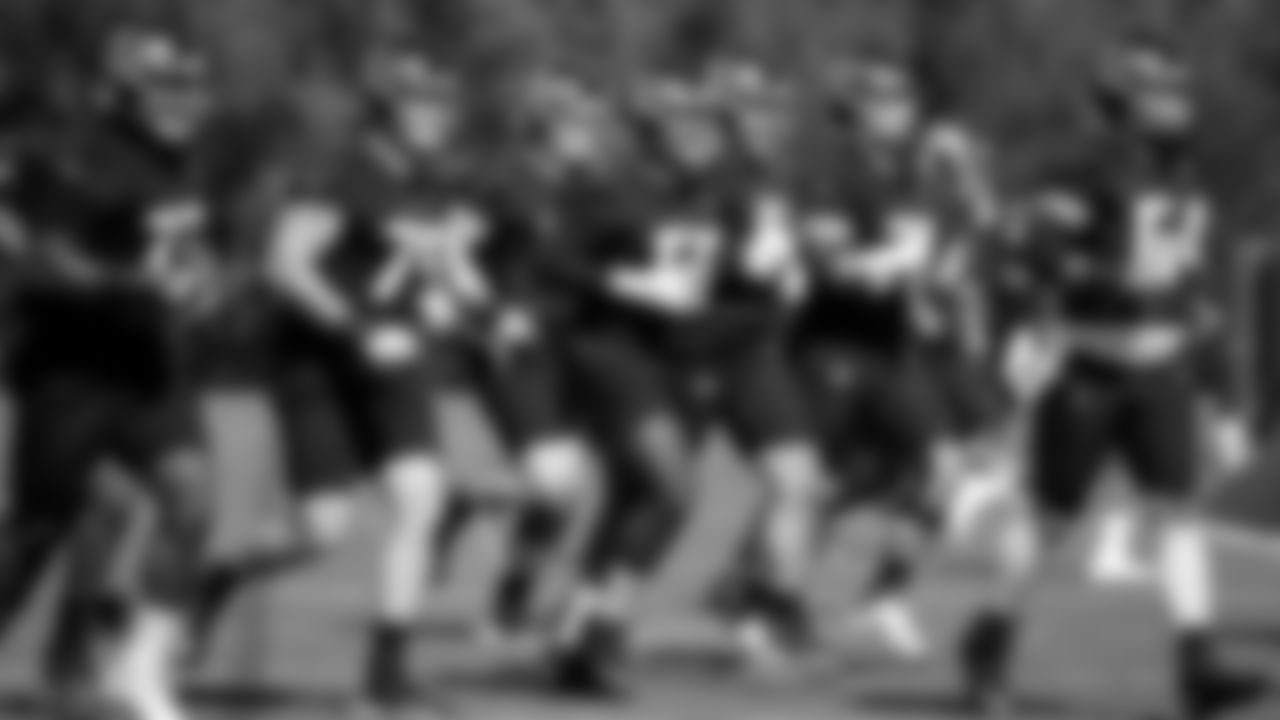 The offensive line runs together during practice at IBM Performance Field. (Photo by Kara Durrette/Atlanta Falcons)