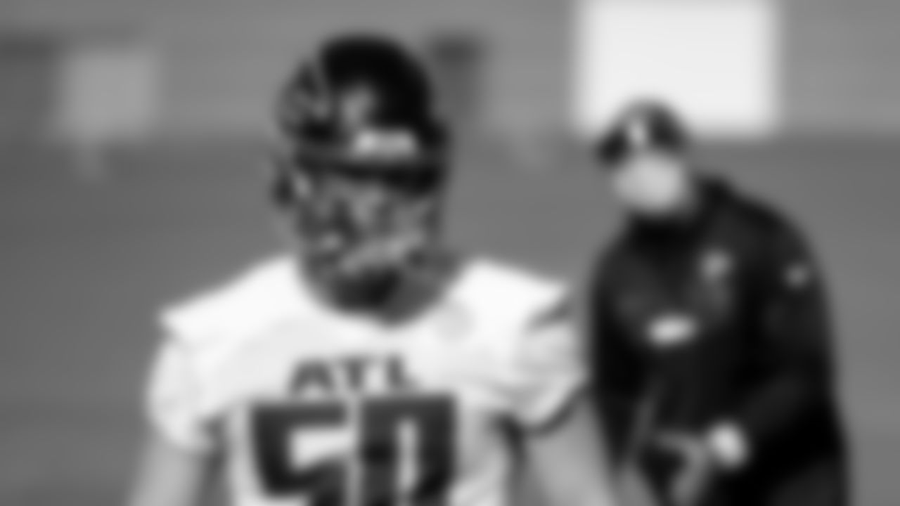Atlanta Falcons defensive end John Cominsky #50 looks on during practice at IBM Performance Field.