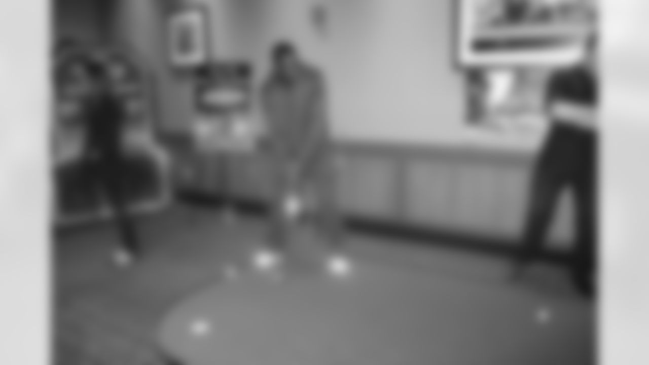 WR Harry Douglas takes a shot at putt-putt