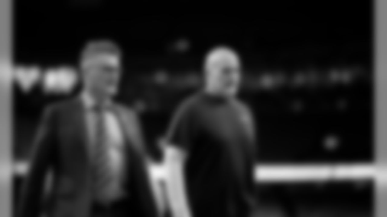 Atlanta Falcons general manager Thomas Dimitroff (left) walks with Atlanta Falcons head coach Dan Quinn (right) at the Mercedes-Benz Superdome before the game against the New Orleans Saints in New Orleans, LA, on Sunday November 10, 2019. (Photo by Mark Brown/Atlanta Falcons)
