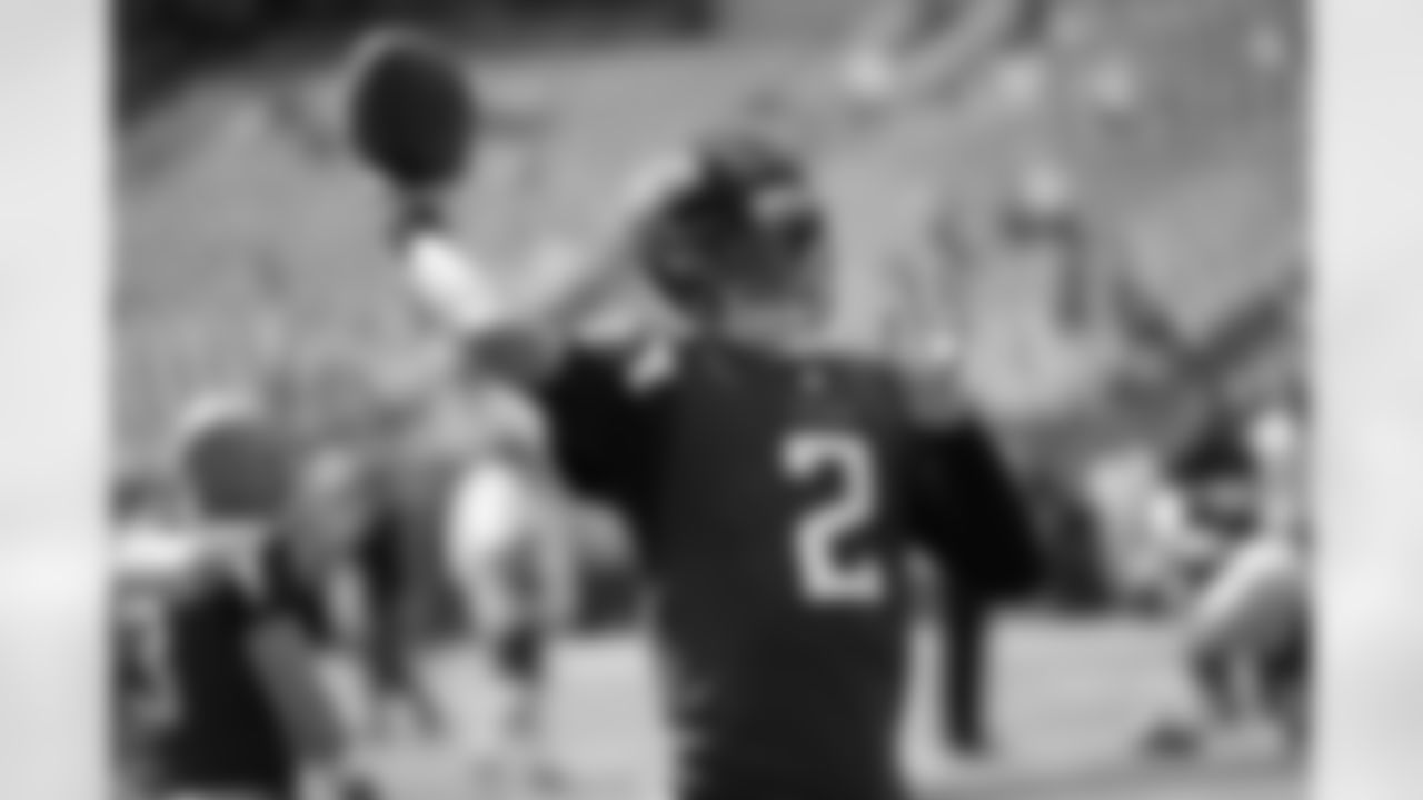 QB Matt Ryan warms up his arm before the game.