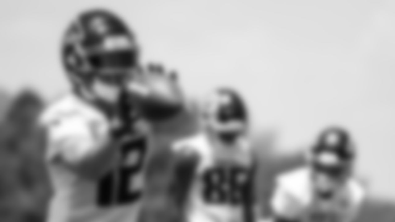 Atlanta Falcons wide receiver Chris Rowland #12 catches a ball during organized team activities in Phase III of the Atlanta Falcons offseason program on May 27, 2021.