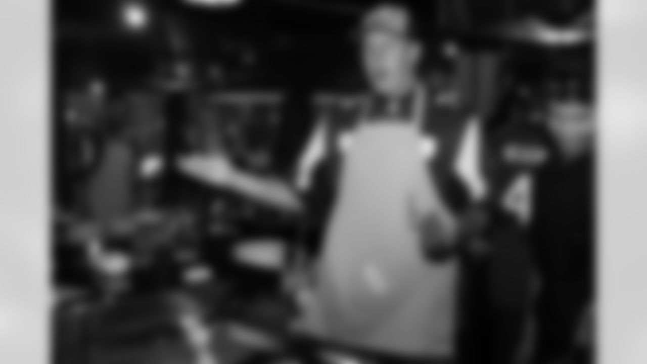 T Daniel Brunskill cooking at the dazzle and dine event