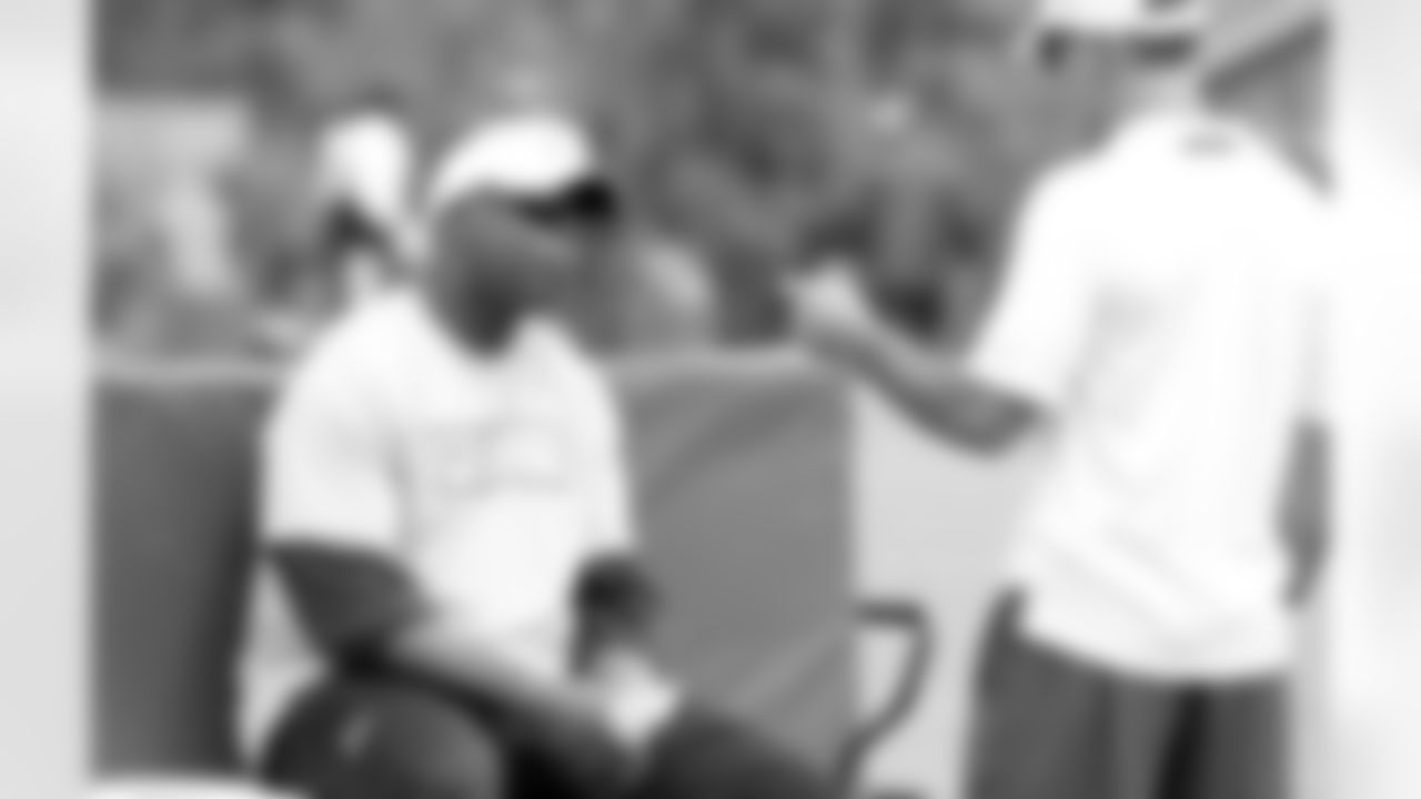 Defensive coordinator Mike Nolan and secondary coach Tim Lewis