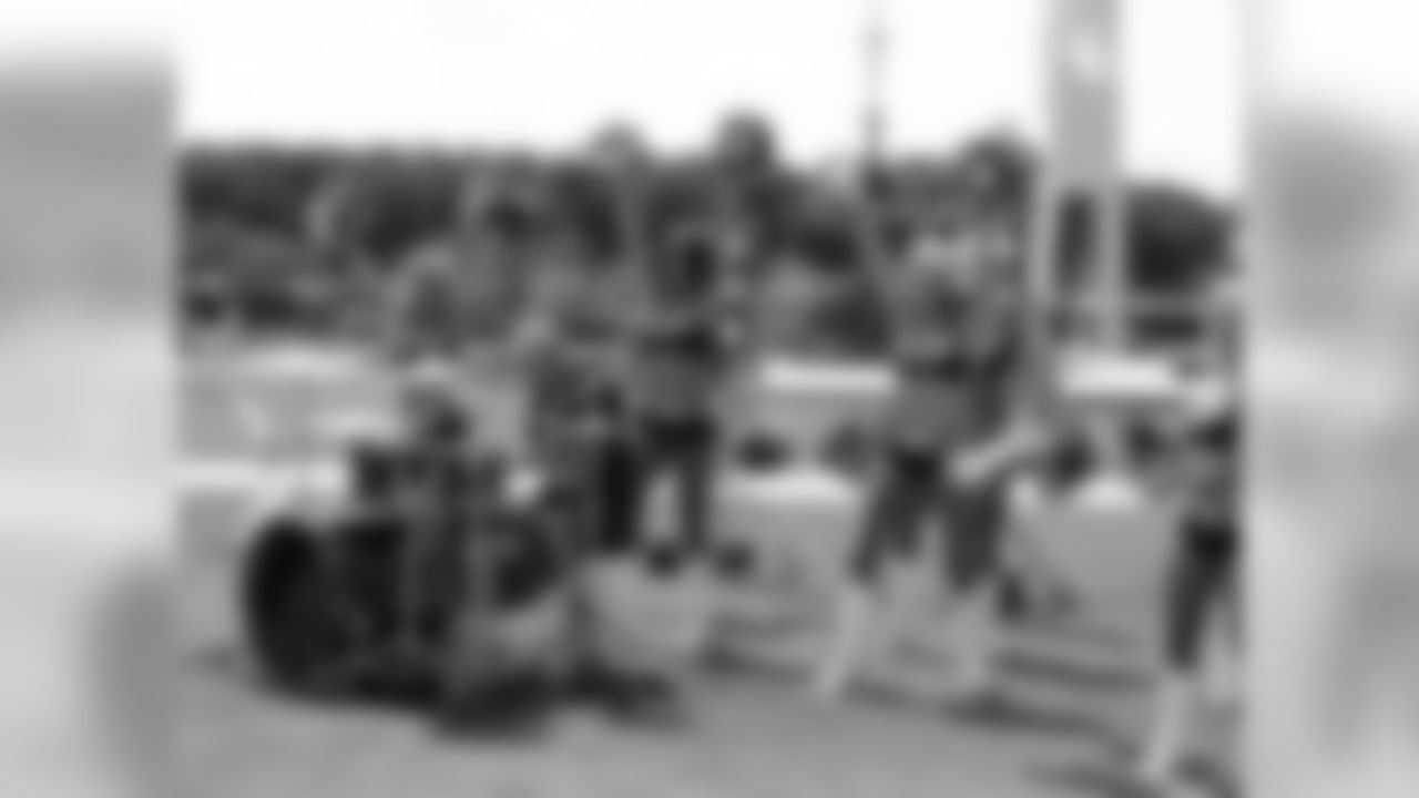 Drummer Morgan Rose rocks out with the cheerleaders // Sevendust Music Video Shoot // 9/16/10 - Falcons Landing