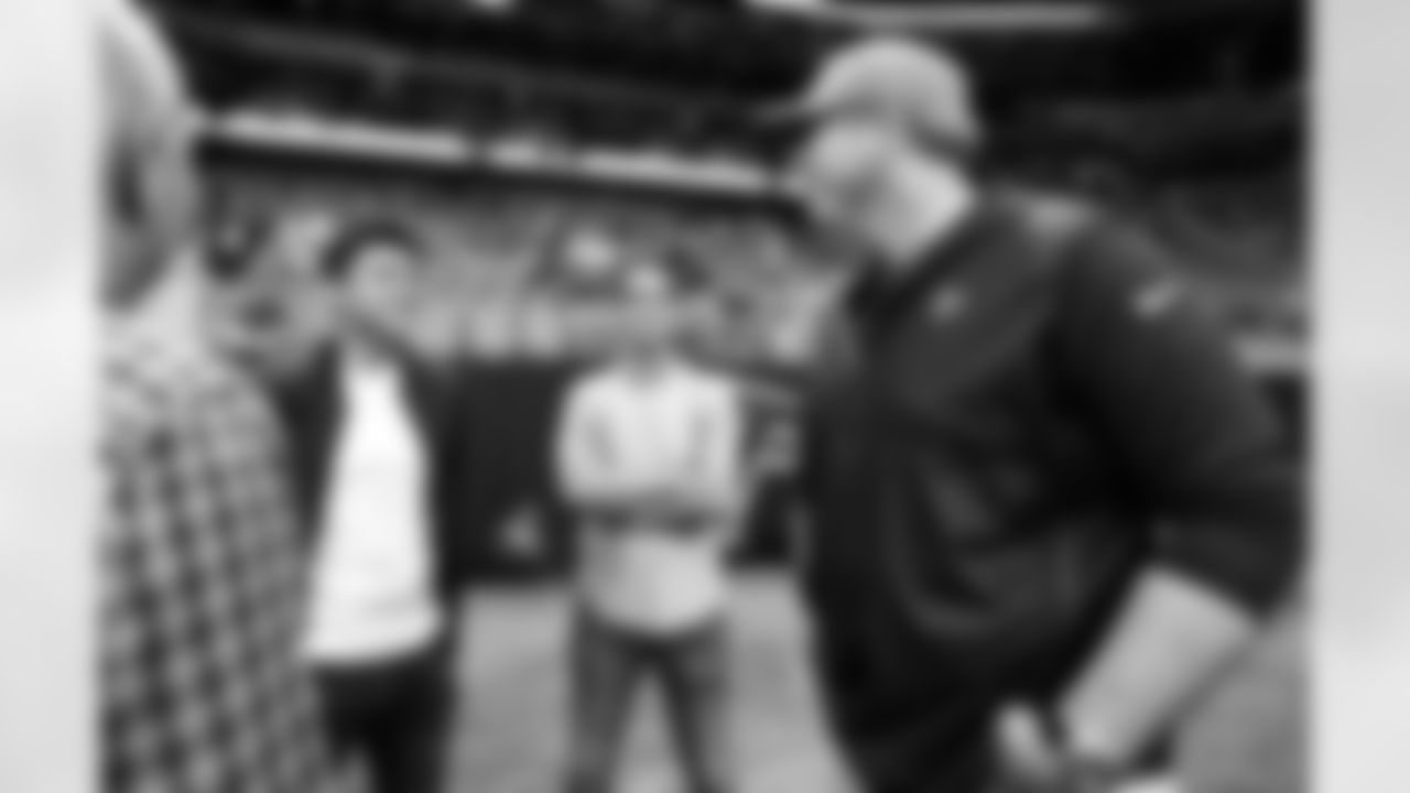 Atlanta Falcons head coach Arthur Smith meets with Atlanta United head coach Gonzalo Pineda prior to a game against the Cleveland Browns at Mercedes-Benz Stadium in Atlanta, Georgia on Sunday, August 29, 2021. (Photo by Dakota Williams/Atlanta Falcons)