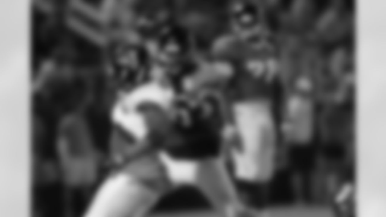 DE Emmanuel Stephens sheds a blocker // Combined Practice with Jacksonville // August 17, 2011 // Jacksonville, Fla. —