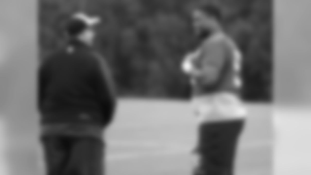 DT Corey Peters talks to tight ends coach, Chris Scelfo