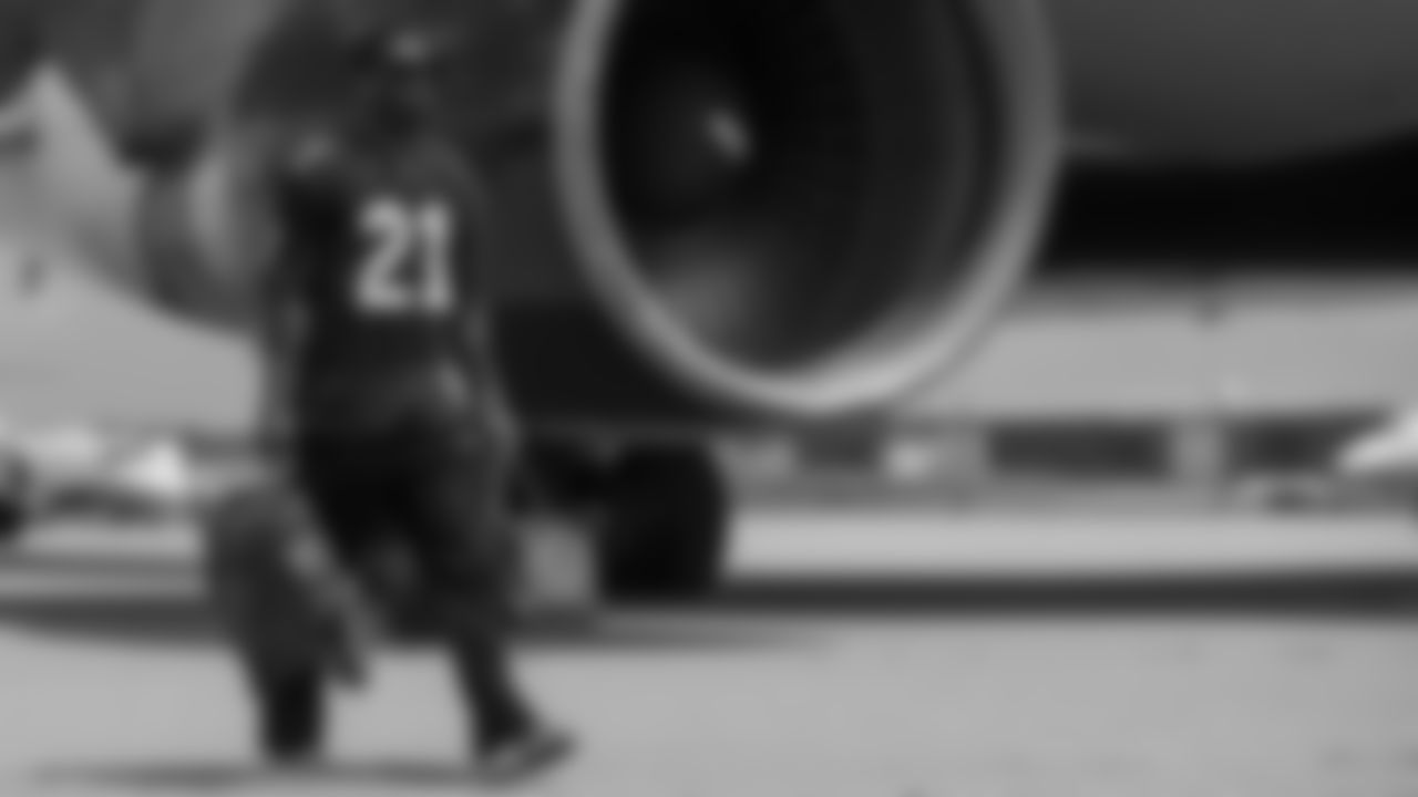 Atlanta Falcons wide receiver Josh Ali #80 boards the plane at Hartsfield-Jackson International Airport in Atlanta, Ga. on Monday, August 7, 2023. (Photo by Shanna Lockwood/Atlanta Falcons)