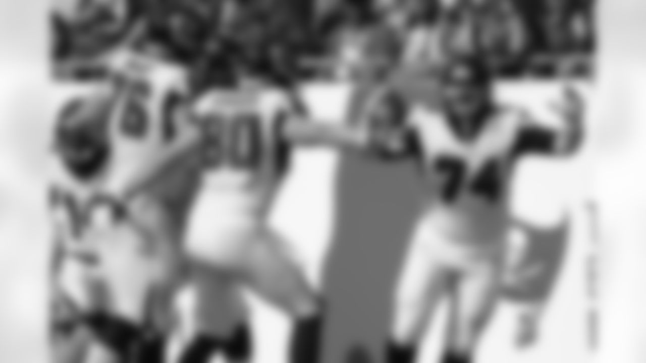 Atlanta Falcons offensive tackle Ty Sambrailo (74) celebrates his 35-yard touchdown reception with tight end Luke Stocker (80) and offensive tackle Kaleb McGary (76) during the first half of an NFL football game against the Tampa Bay Buccaneers Sunday, Dec. 29, 2019, in Tampa, Fla. (AP Photo/Jason Behnken)
