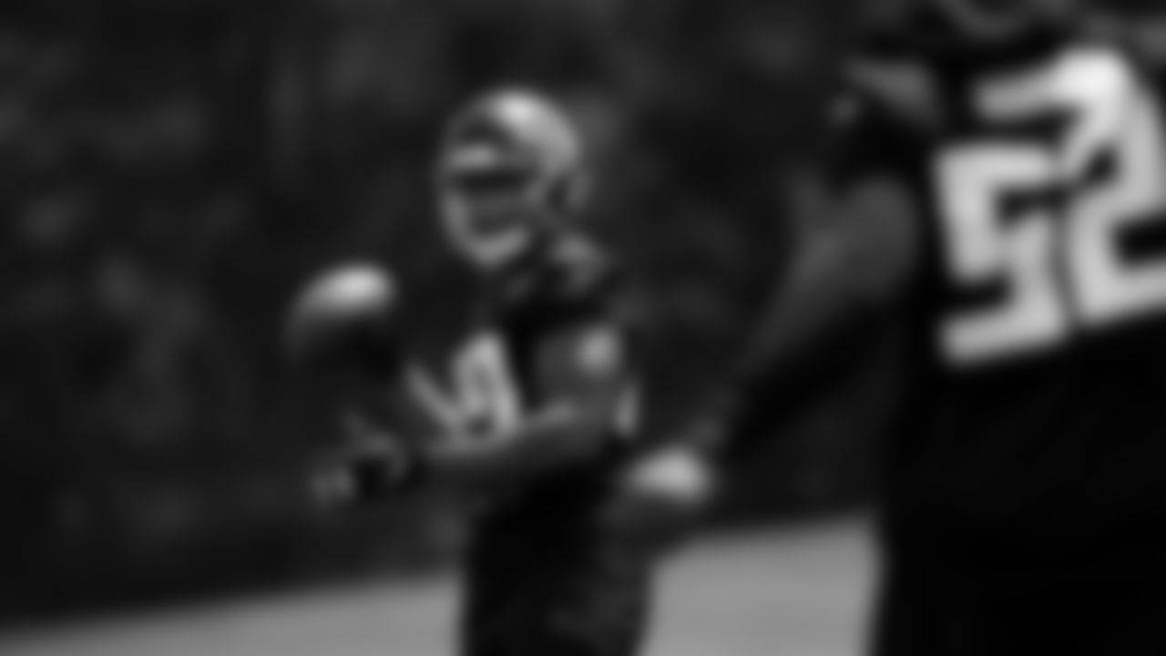 Atlanta Falcons linebacker Kobe Jones #49 warms up during organized team activities in Phase III of the Atlanta Falcons offseason program on May 25, 2021.