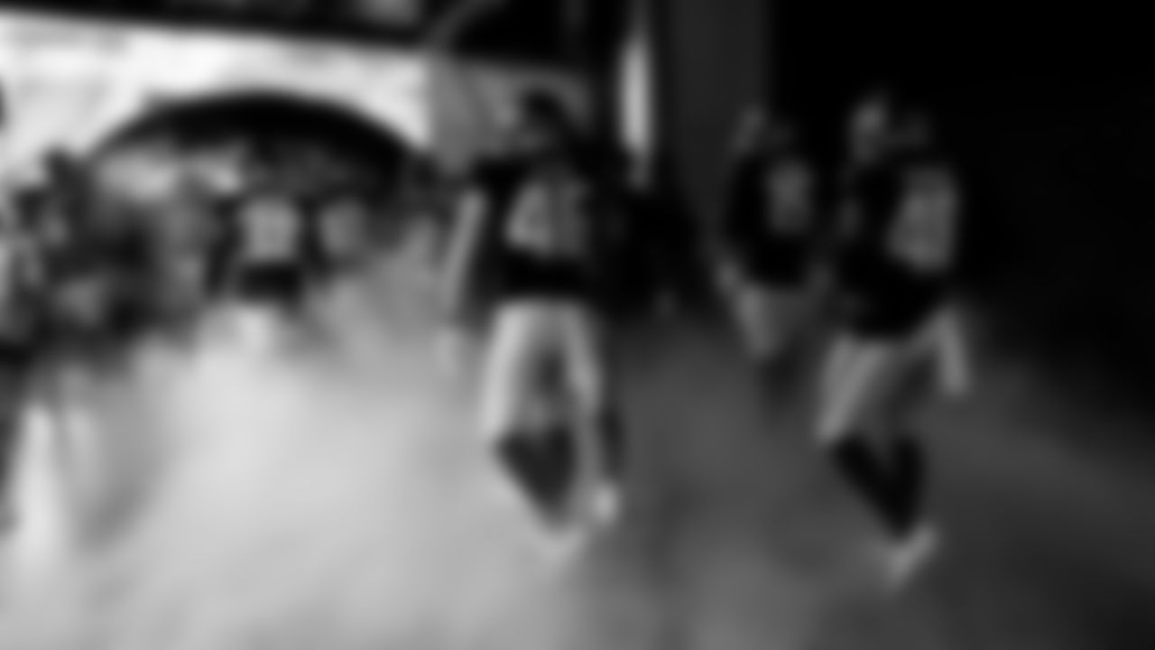 Atlanta Falcons players walk out of the locker room before the Falcon's pre-season game against the Tennessee Titans at Mercedes-Benz Stadium in Atlanta, Georgia on Friday, August 13, 2021. (Photo by Brandon Magnus/Atlanta Falcons)