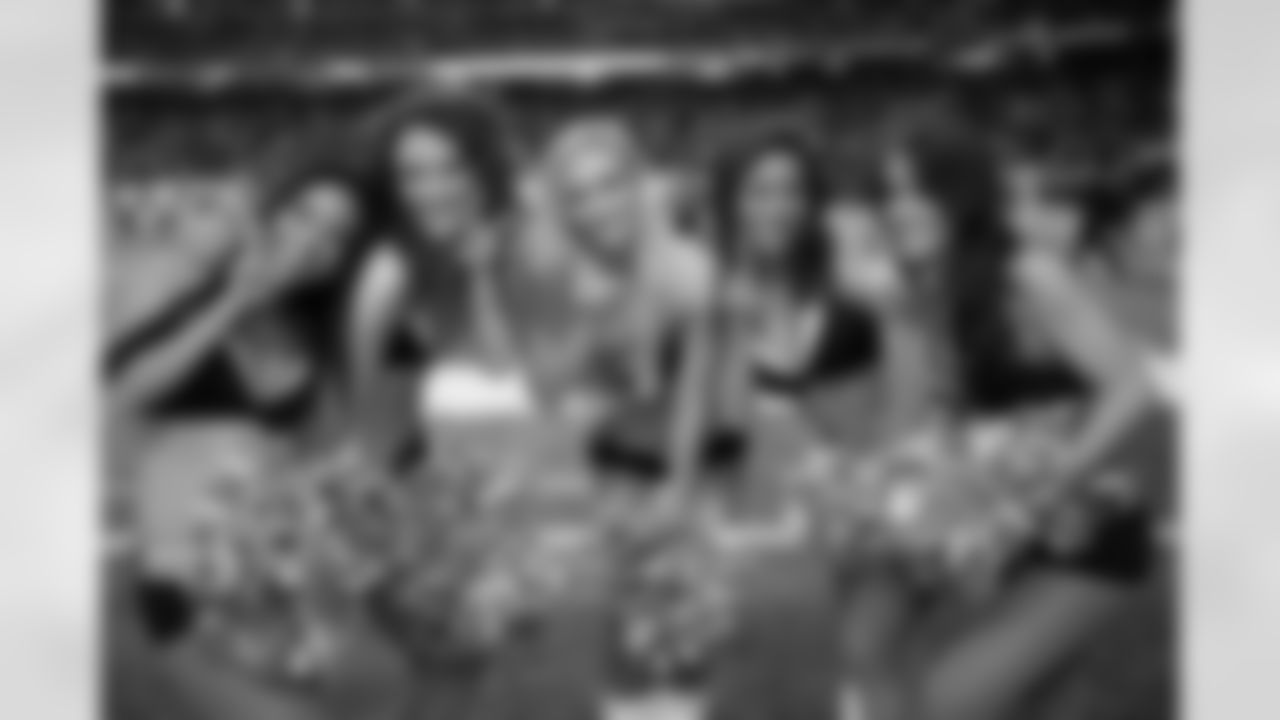 A few of the Atlanta Falcons Cheerleaders pose on the sideline (PHOTOS: Art Morrison, Special to AtlantaFalcons.com)