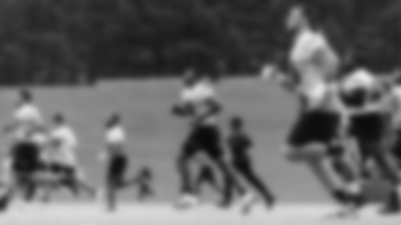 The Atlanta Falcons offense runs during organized team activities in Phase III of the Atlanta Falcons offseason program on May 25, 2021.