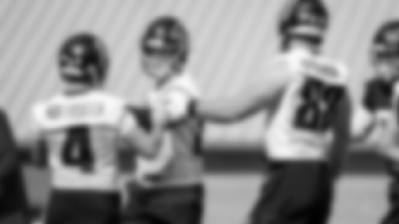 Atlanta Falcons punter Sterling Hofrichter #4 fist bumps tight end Jaeden Graham #87 and tight end Luke Stocker #88 during practice at IBM Performance Field. (Photo by Kara Durrette/Atlanta Falcons)