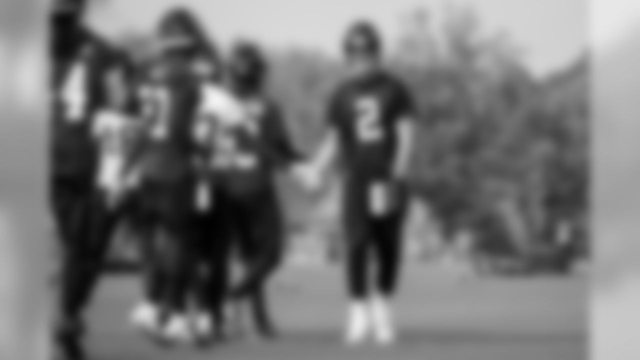 Atlanta Falcons quarterback Matt Ryan #2 high-fives teammates during practice. (Photo by Kara Durrette/Atlanta Falcons)