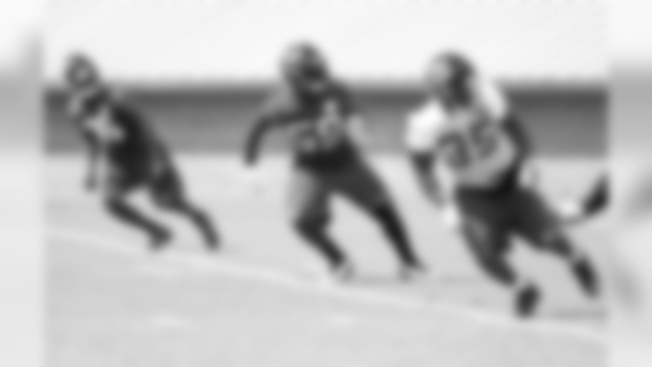 CB Josh Wilson, LB Joplo Bartu and RB Antone Smith