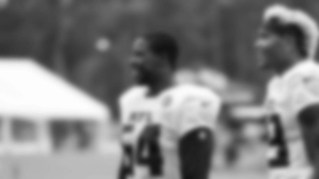 Atlanta Falcons linebacker Foye Oluokun #54 and linebacker Mykal Walker #43 smile and look on at AT&T Atlanta Falcons Training Camp on August 24, 2020 in Flowery Branch, GA. (Photo by Kara Durrette/Atlanta Falcons)