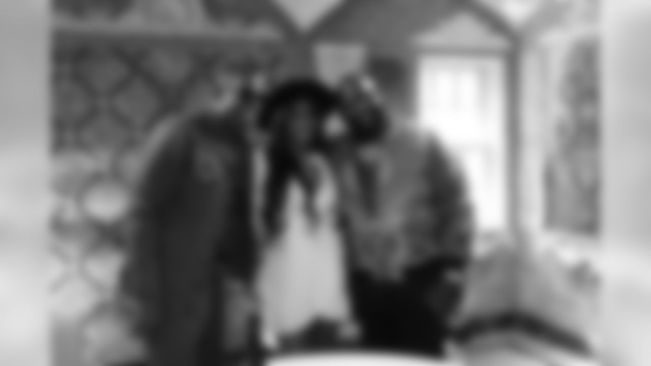 Deion Sanders and Rick Ross pose with Deiondra Sanders at the Versace Mansion ahead of Super Bowl LIV, Wednesday, Jan. 29, 2020 in Miami, Fla. (Logan Bowles/NFL)