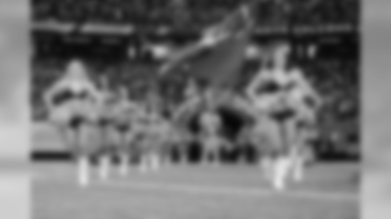 The Atlanta Falcons Cheerleaders run onto the field (PHOTOS: Art Morrison, Special to AtlantaFalcons.com)