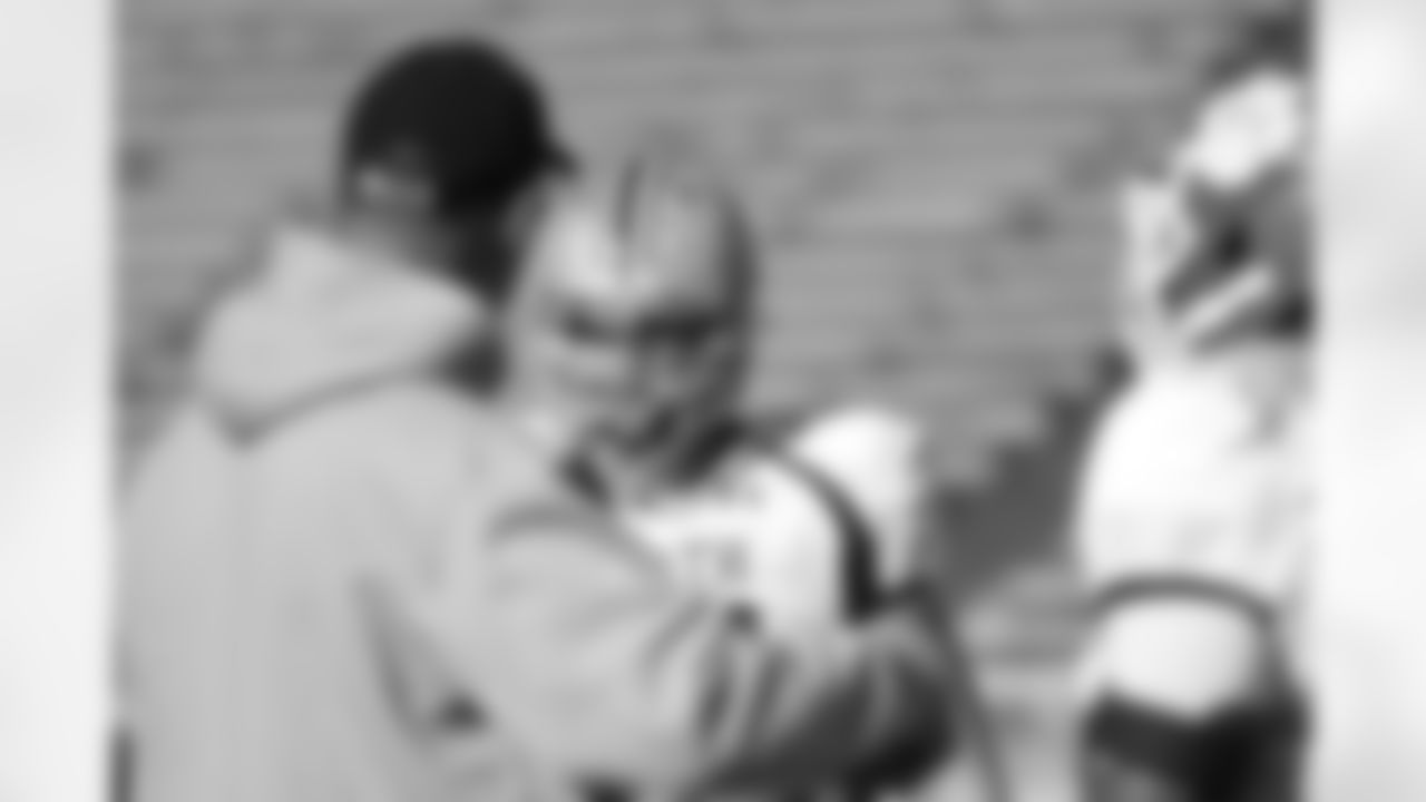 Offensive line coach Mike Tice and OT Jack Mewhort