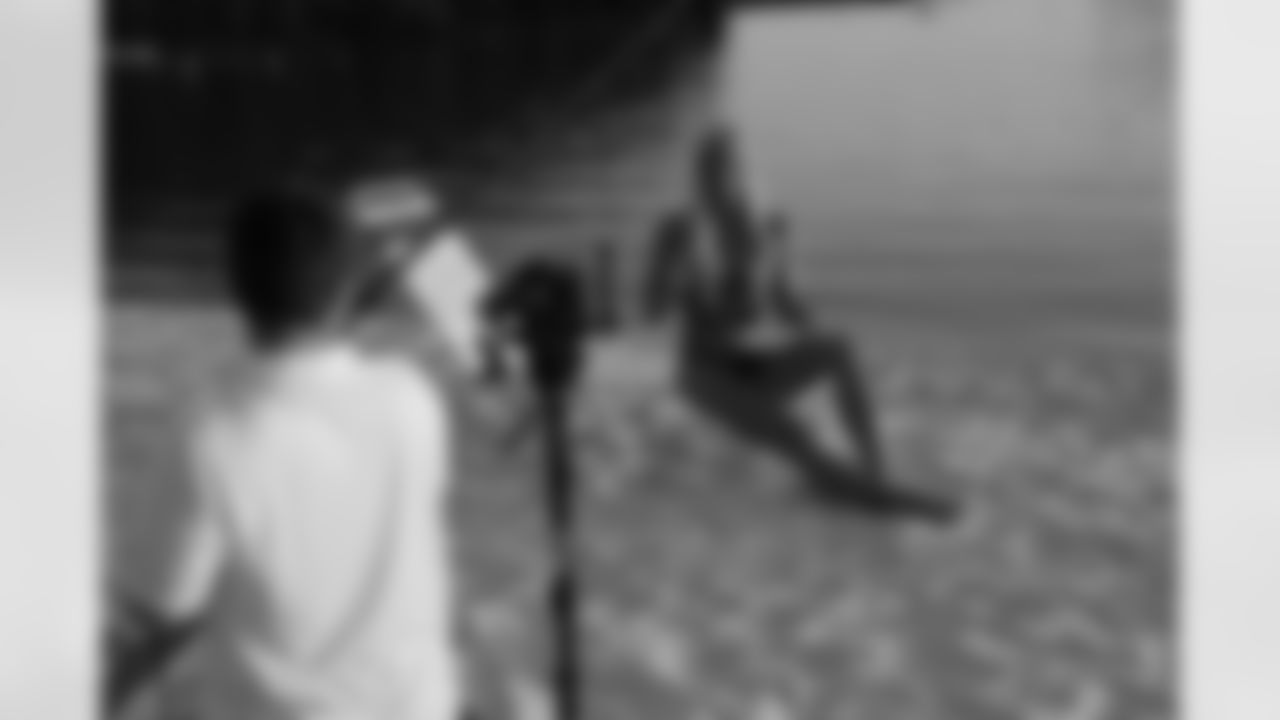 Kat M. films a video bio after her photoshoot