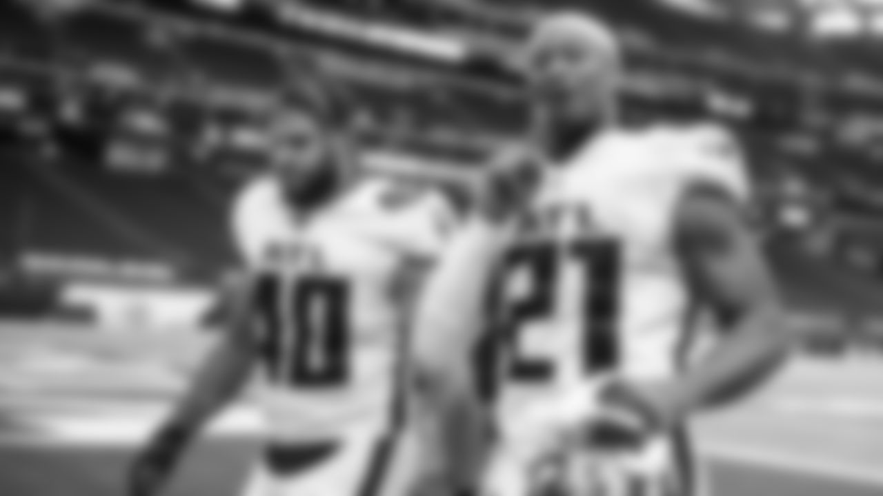 Atlanta Falcons running back Todd Gurley #21 walks with fullback Keith Smith #40 after beating the Minnesota Vikings on October 18, 2020. (Photo by Austin Hittel/AtlantaFalcons)