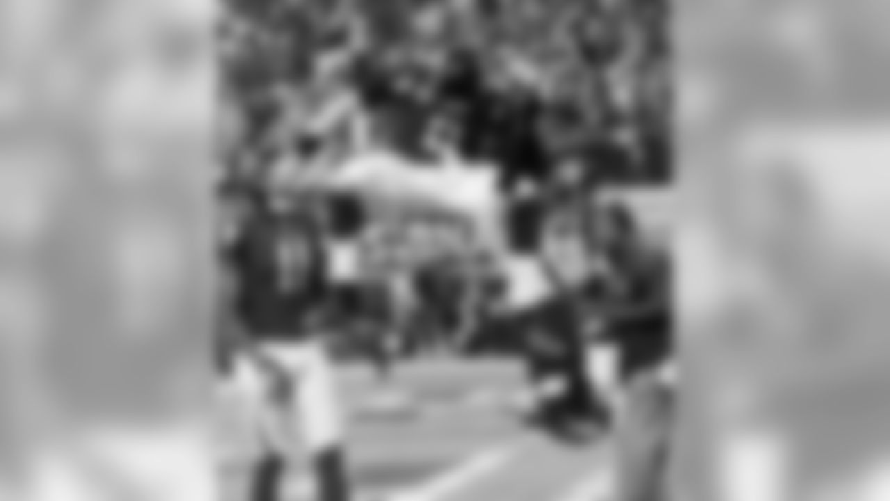 Ryan celebrates following one of his touchdowns against the Seahawks in the NFC playoffs.
