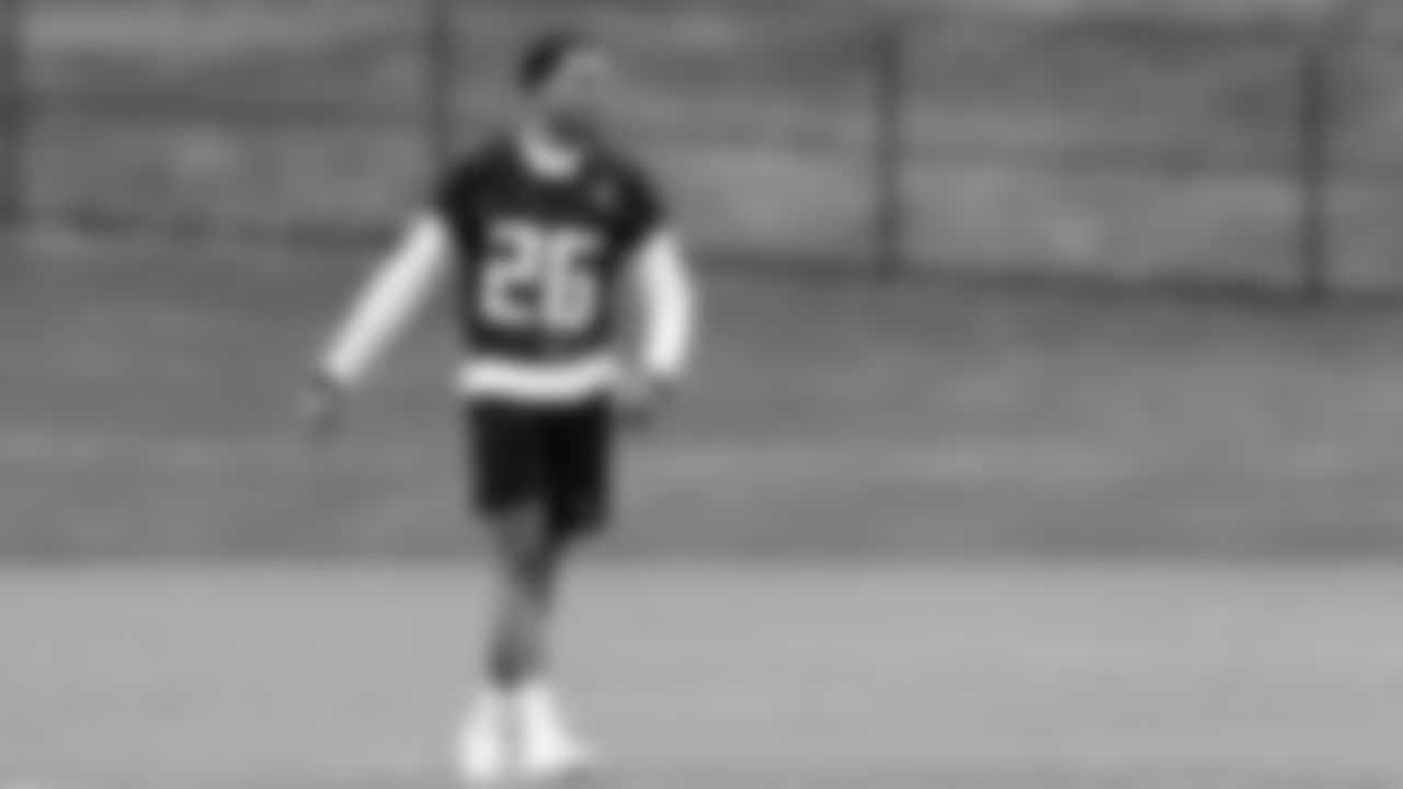 Atlanta Falcons free safety Isaiah Oliver #26 looks on during field work drills in Phase II of the Atlanta Falcons offseason program on May 18, 2021.