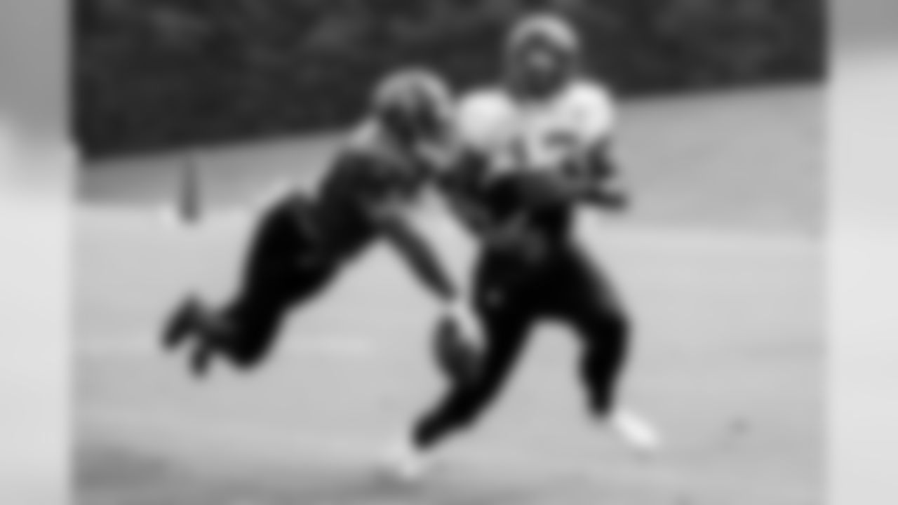 Atlanta Falcons defensive back Sharrod Neasman #41 gets to the ball before wide receiver Christian Blake #13 on the tenth day of practice. (Photo by Kara Durrette/Atlanta Falcons)