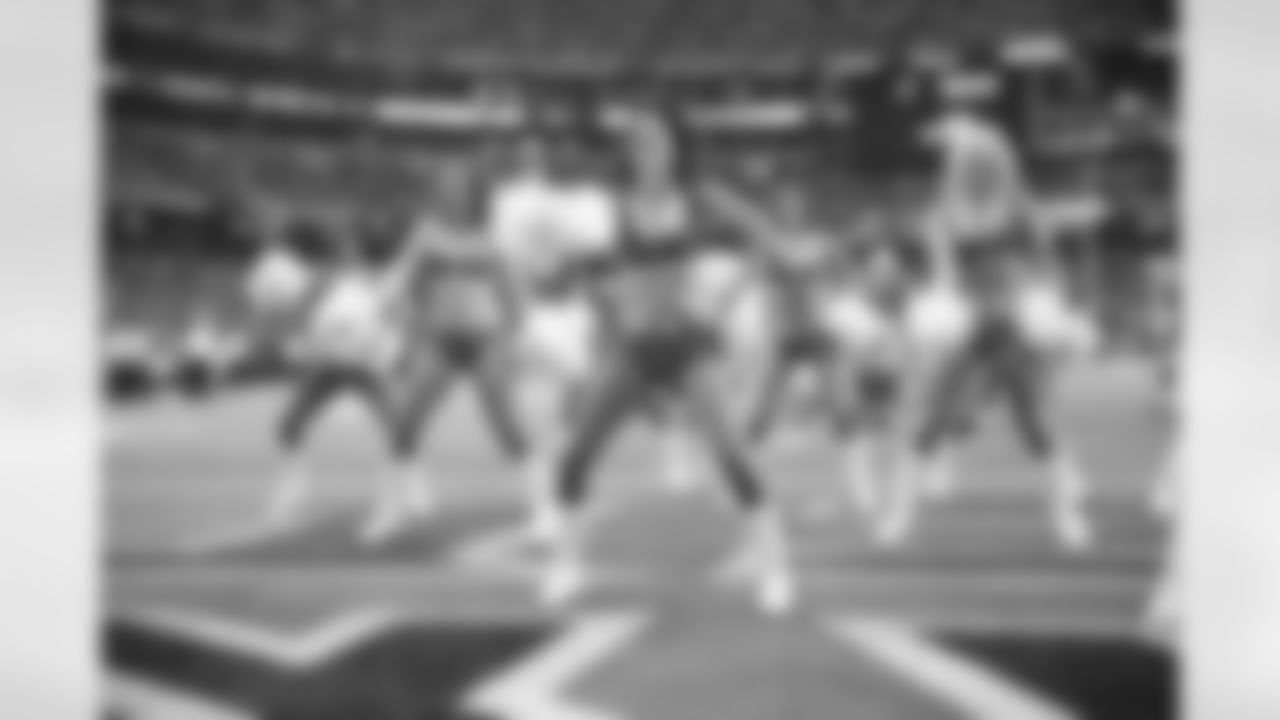 The Atlanta Falcons Cheerleaders perform in the end zone