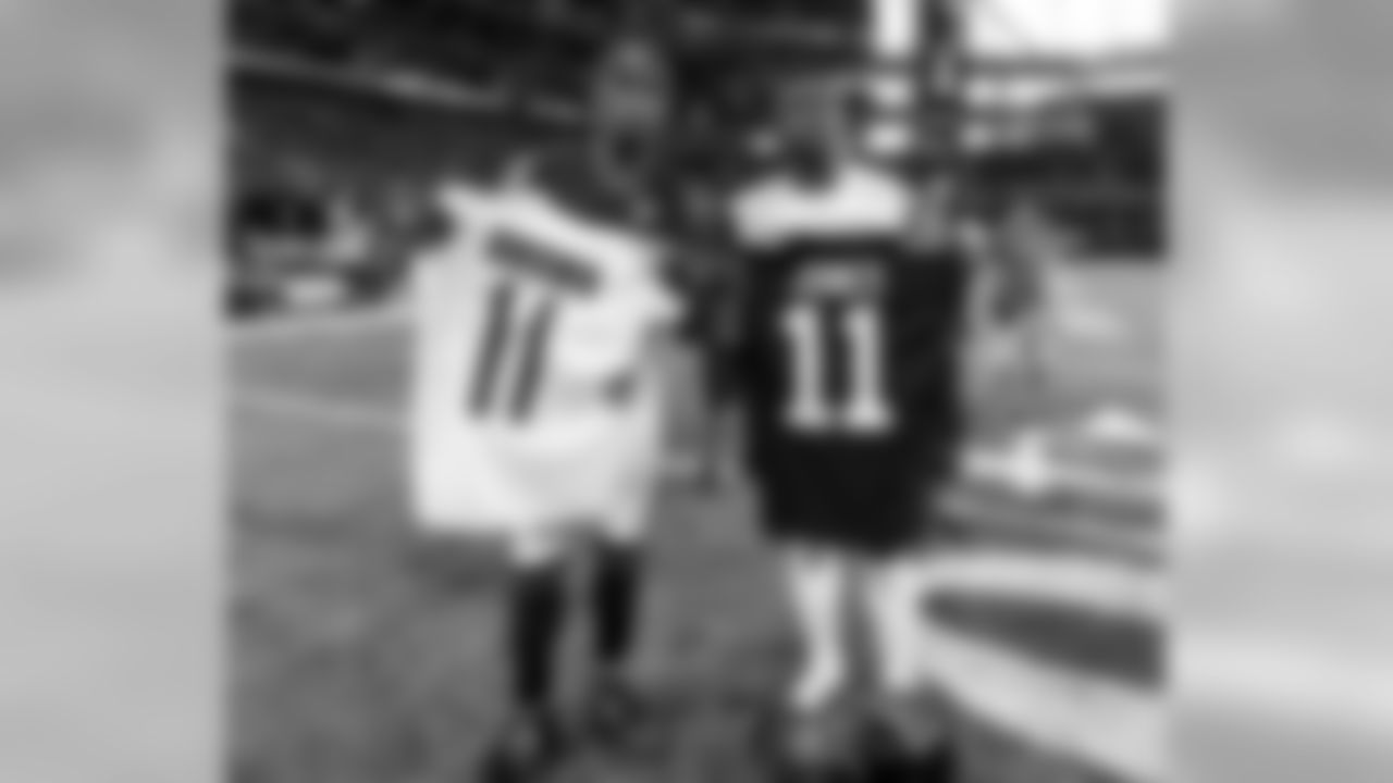 Atlanta Falcons wide receiver Julio Jones #11 and Tennessee Titans wide receiver A.J. Brown #11 swap jerseys after the game at Mercedes-Benz Stadium in Atlanta, Georgia, on Sunday September 29, 2019. (Photo by Lynn Bass/Atlanta Falcons)