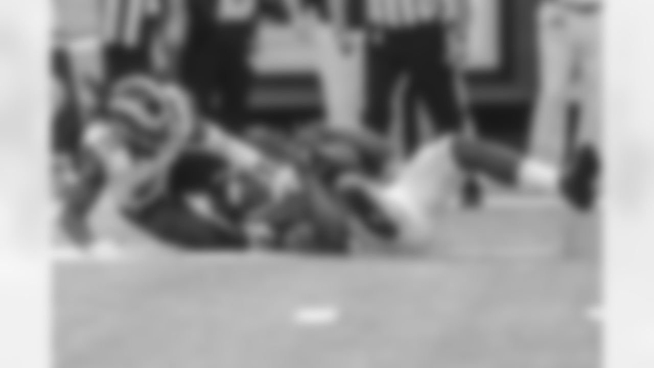 WR Julio Jones hangs on as he gets taken down