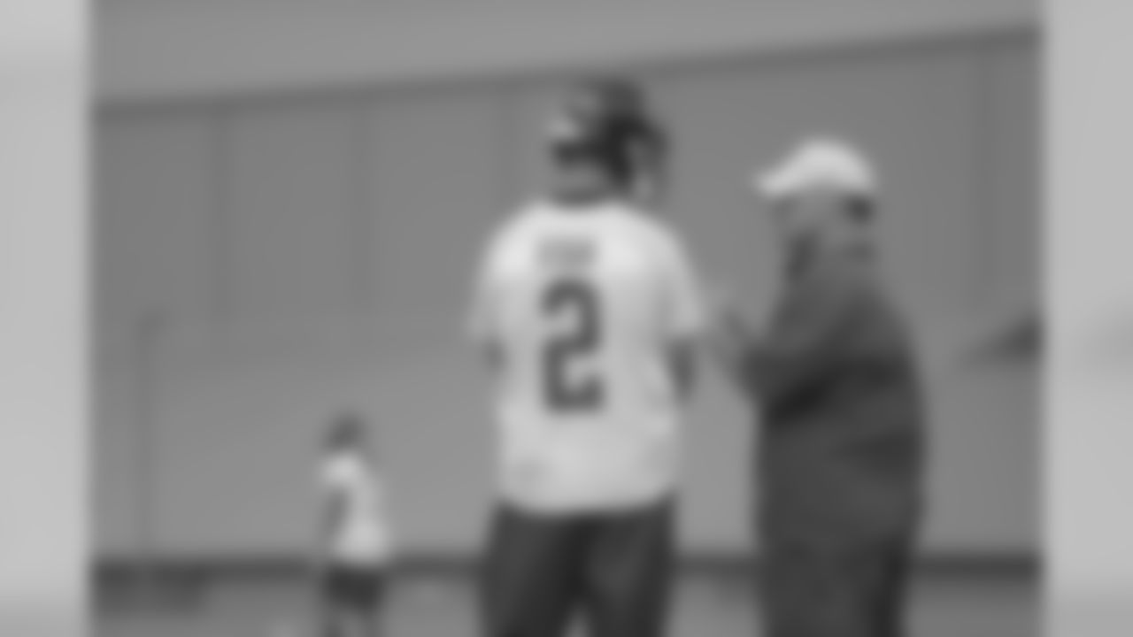 QB Matt Ryan chats with director of sports medicine and performance Marty Lauzon
