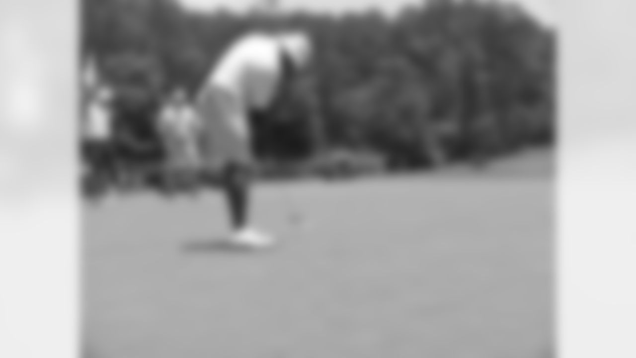Chris Doleman takes his turn putting on the 17th // Seventh Annual Verizon Network of Champions Golf Tournament // 6/13/11 // Suwanee, Ga. -