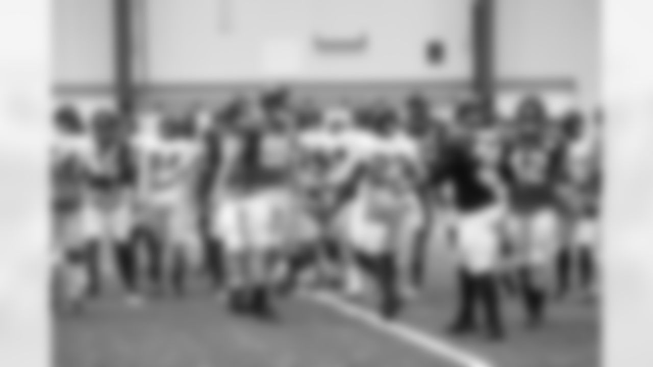 The Falcons coming together before practice