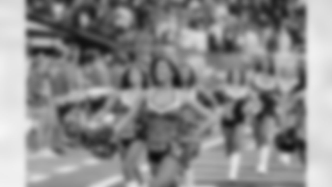 Emily B. and the rest of the Falcons Cheerleaders make their way on the field before the game begins