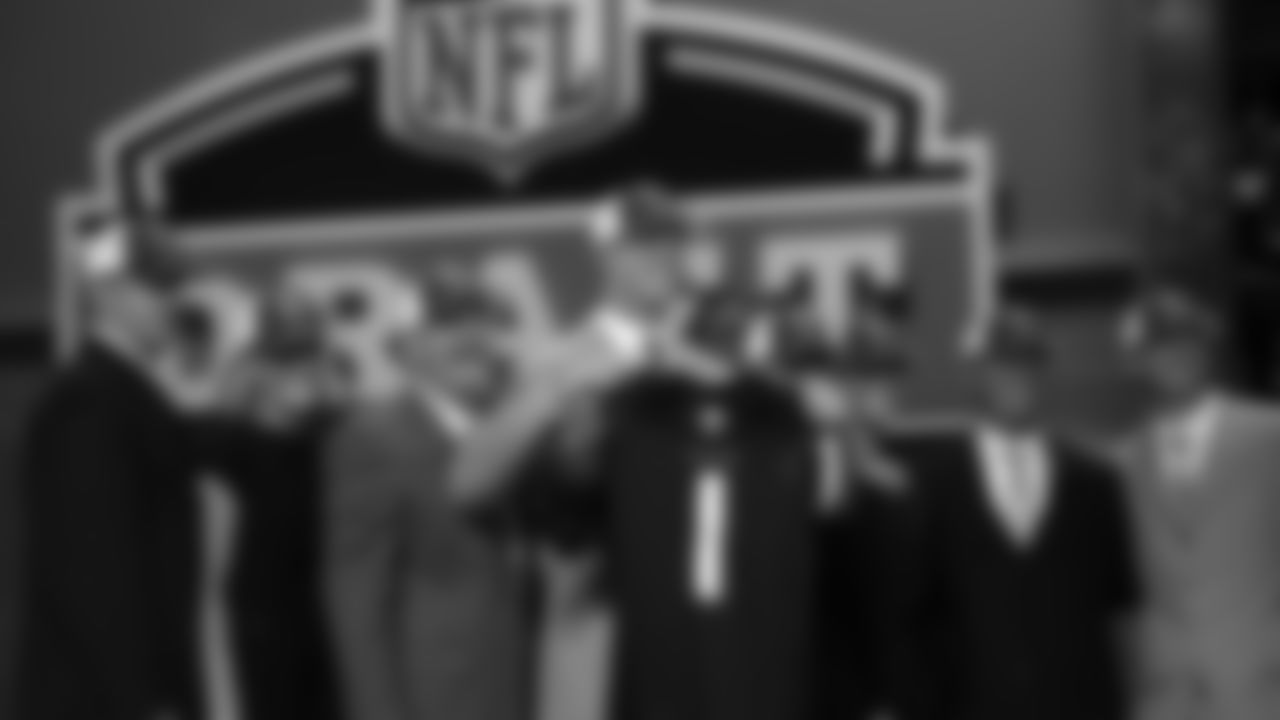 Quarterback Matt Ryan holds up a jersey after being selected by the Atlanta Falcons as the third pick overall in the first round of the NFL Draft Saturday, April 26, 2008, in New York.(AP Photo/Jason DeCrow)