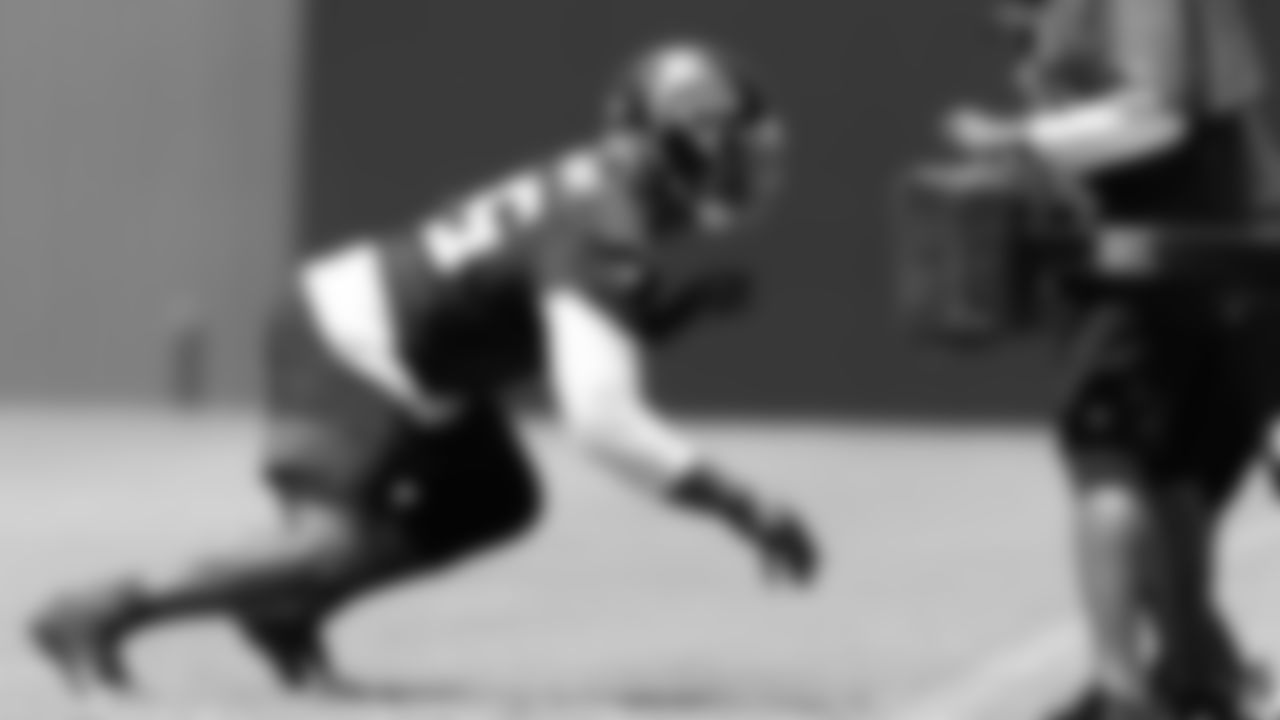 Atlanta Falcons defensive lineman Ta'Quon Graham #95 in action during organized team activities in Phase III of the Atlanta Falcons offseason program on June 4, 2021.
