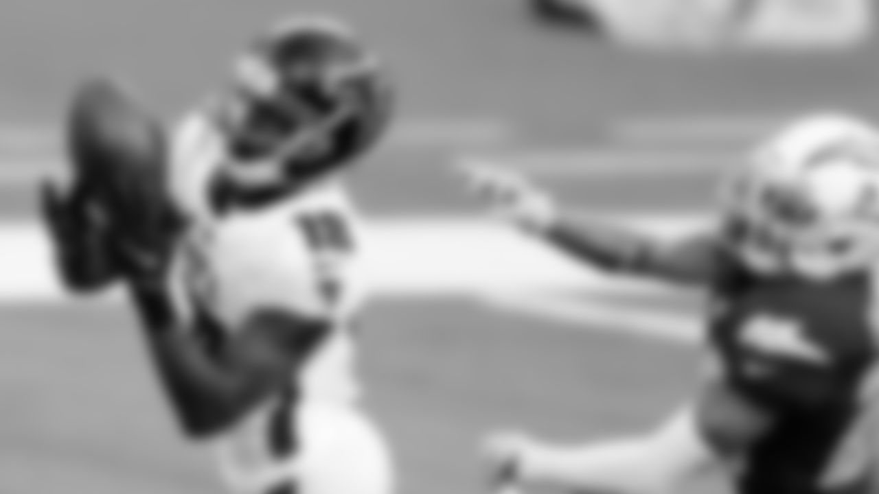 Atlanta Falcons wide receiver Calvin Ridley #18 receives a 39-yard touchdown pass from wide receiver Russell Gage #83 during the first quarter against the Los Angeles Chargers on December 13, 2020.