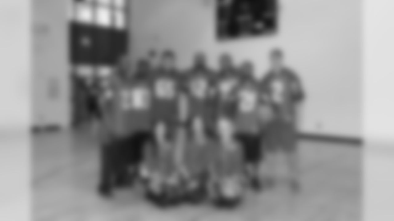 Hometown Huddle // Players and cheerleaders pose at JFK Middle School // 10/19/10 - Atlanta, Ga. //