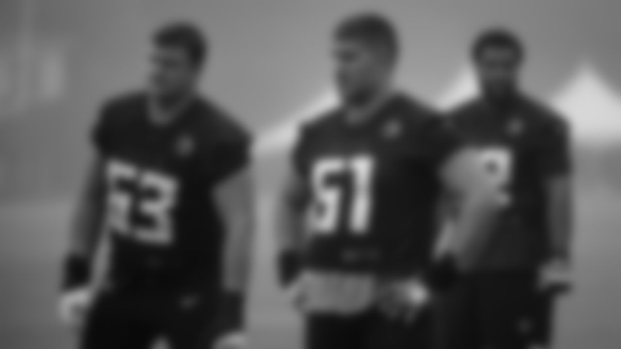 Atlanta Falcons center Alex Mack #51 and guard Chris Lindstrom #63 look on during practice at IBM Performance Field. (Photo by Kara Durrette/Atlanta Falcons)